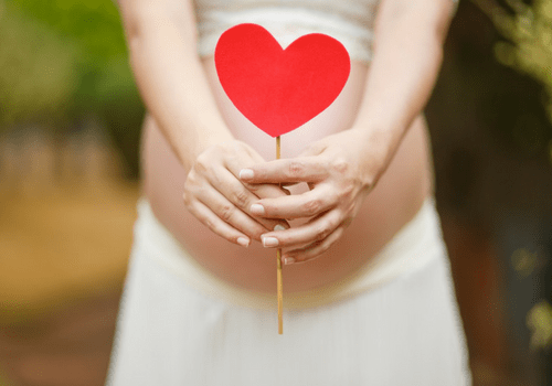 We're pregnant! This exciting article includes a pregnancy announcement to my husband and a pregnancy announcement photo including her soon to be big sister. This includes two great social media pregnancy announcement ideas. I also go into the tips and tricks to conceive and what ovulation kit worked our first month! #pregnancy #parenting #maternity #familygoals
