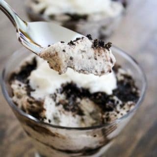 Pouring Cookies and Cream Sauce on Mousse