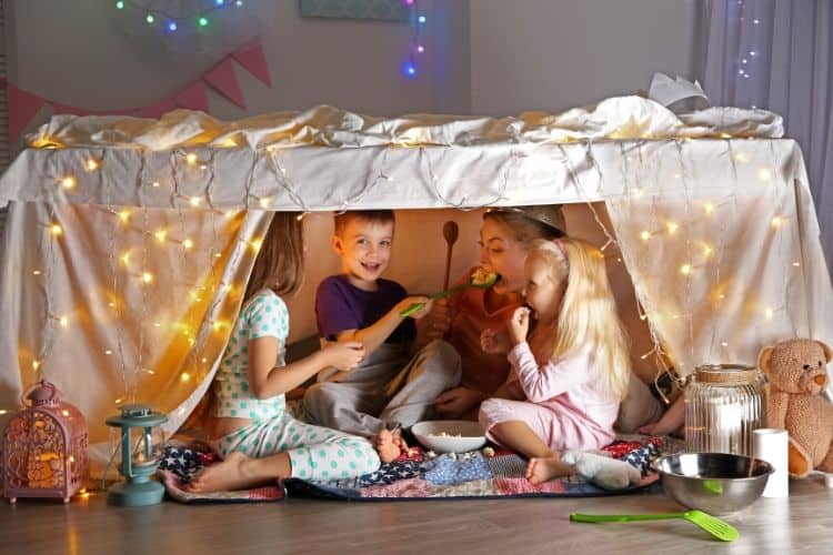 Mom and kids in a fort