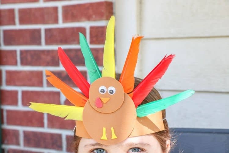 Completed Turkey Headband for kids on top of a girl's head
